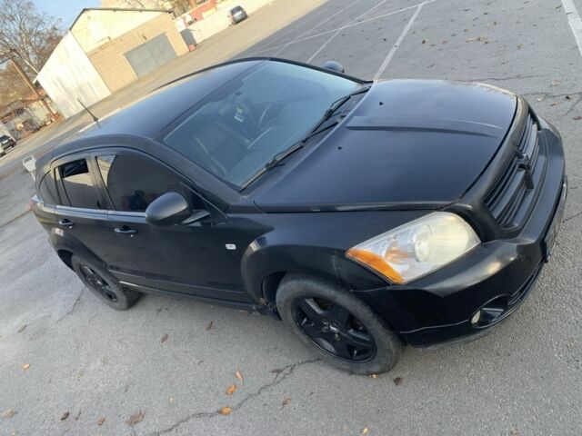 Черный Додж Калибер, объемом двигателя 2 л и пробегом 250 тыс. км за 1900 $, фото 7 на Automoto.ua