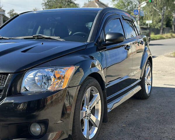 Чорний Додж Caliber, об'ємом двигуна 2.4 л та пробігом 178 тис. км за 8500 $, фото 1 на Automoto.ua
