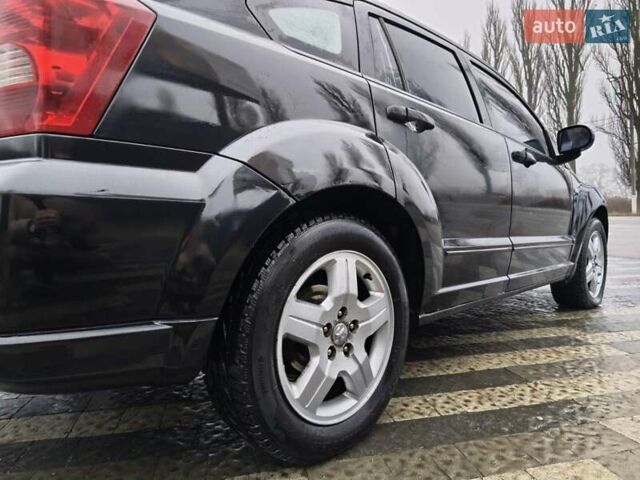 Черный Додж Калибер, объемом двигателя 2 л и пробегом 303 тыс. км за 5700 $, фото 2 на Automoto.ua