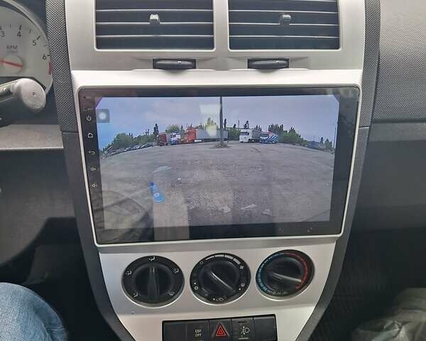 Черный Додж Калибер, объемом двигателя 1.8 л и пробегом 279 тыс. км за 5300 $, фото 1 на Automoto.ua