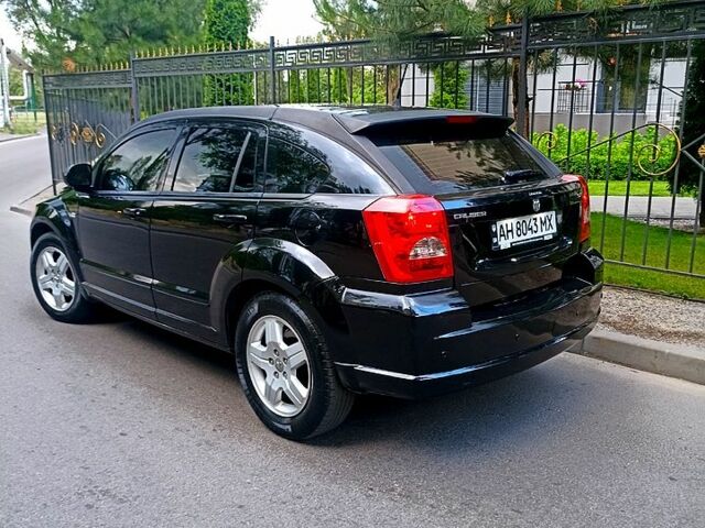 Черный Додж Калибер, объемом двигателя 2 л и пробегом 163 тыс. км за 5950 $, фото 1 на Automoto.ua