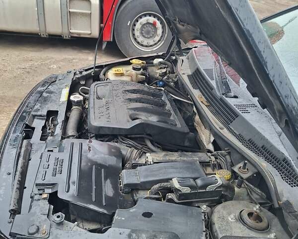 Черный Додж Калибер, объемом двигателя 1.8 л и пробегом 279 тыс. км за 5300 $, фото 3 на Automoto.ua