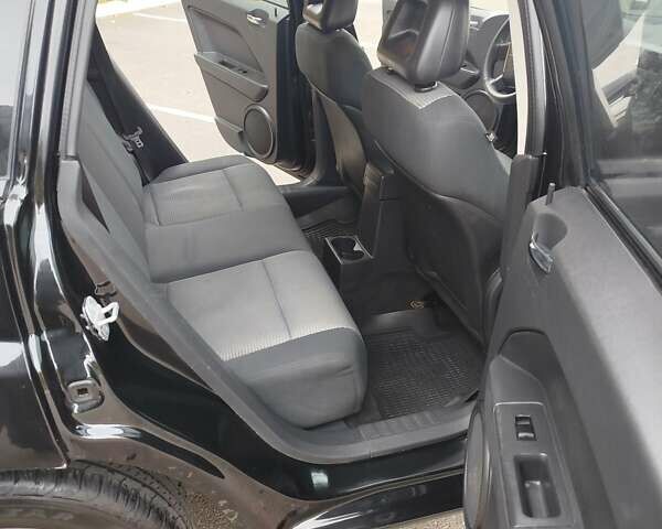 Черный Додж Калибер, объемом двигателя 2 л и пробегом 155 тыс. км за 4900 $, фото 12 на Automoto.ua