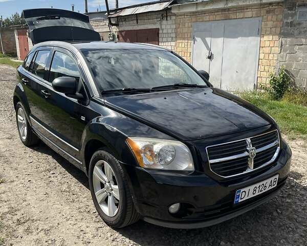 Чорний Додж Caliber, об'ємом двигуна 2 л та пробігом 195 тис. км за 6999 $, фото 1 на Automoto.ua