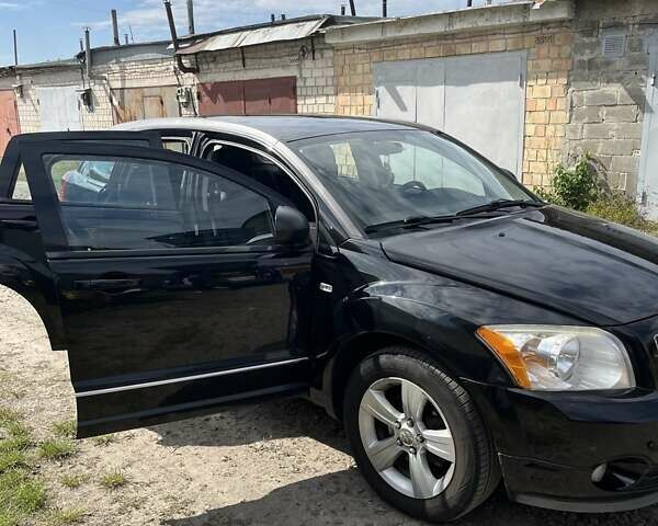 Чорний Додж Caliber, об'ємом двигуна 2 л та пробігом 195 тис. км за 6999 $, фото 7 на Automoto.ua