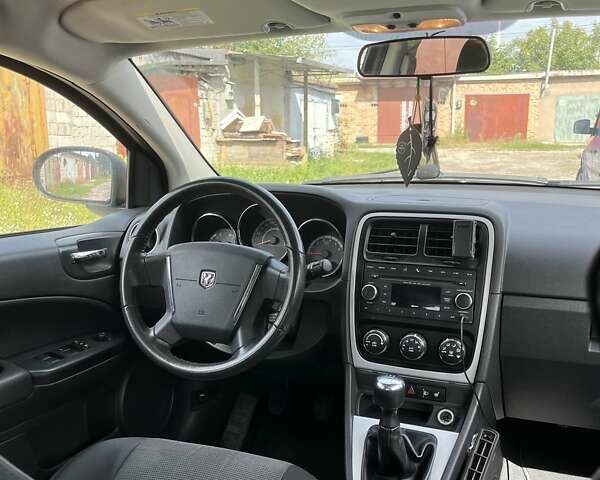 Чорний Додж Caliber, об'ємом двигуна 2 л та пробігом 195 тис. км за 6999 $, фото 10 на Automoto.ua