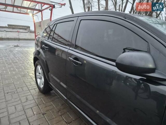 Черный Додж Калибер, объемом двигателя 2.36 л и пробегом 177 тыс. км за 7899 $, фото 12 на Automoto.ua