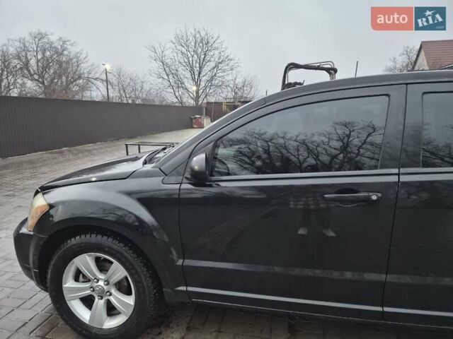 Черный Додж Калибер, объемом двигателя 2.36 л и пробегом 177 тыс. км за 7899 $, фото 32 на Automoto.ua