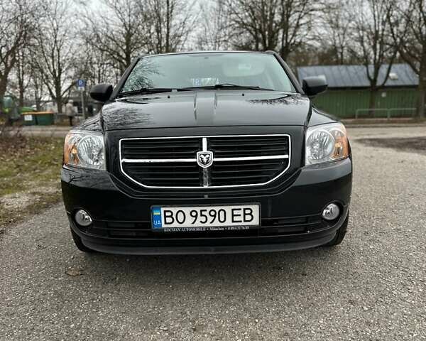 Черный Додж Калибер, объемом двигателя 2 л и пробегом 124 тыс. км за 9000 $, фото 1 на Automoto.ua
