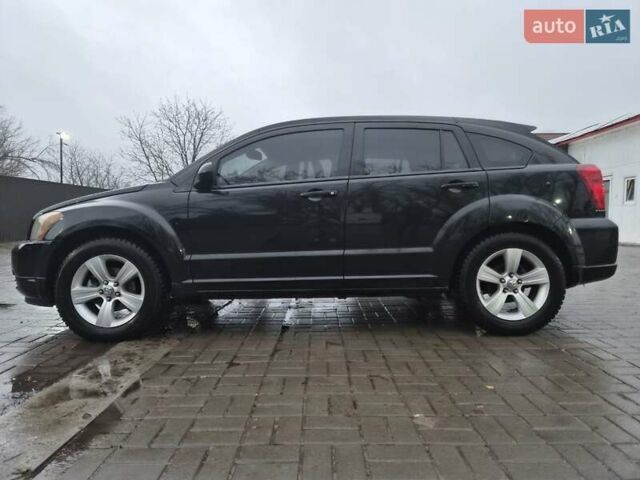 Черный Додж Калибер, объемом двигателя 2.36 л и пробегом 177 тыс. км за 7899 $, фото 29 на Automoto.ua