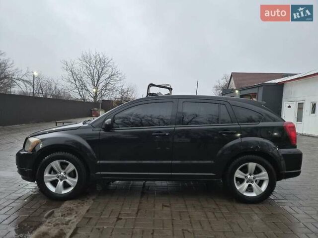 Черный Додж Калибер, объемом двигателя 2.36 л и пробегом 177 тыс. км за 7899 $, фото 26 на Automoto.ua