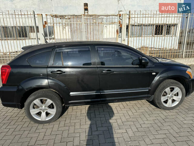 Черный Додж Калибер, объемом двигателя 2 л и пробегом 205 тыс. км за 6500 $, фото 8 на Automoto.ua