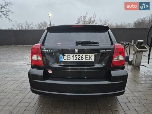 Черный Додж Калибер, объемом двигателя 2.36 л и пробегом 177 тыс. км за 7899 $, фото 14 на Automoto.ua