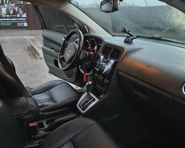 Черный Додж Калибер, объемом двигателя 2.36 л и пробегом 177 тыс. км за 7899 $, фото 6 на Automoto.ua