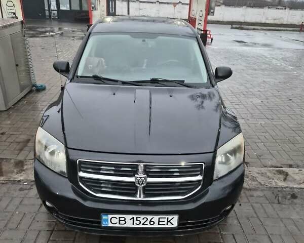 Черный Додж Калибер, объемом двигателя 2.36 л и пробегом 177 тыс. км за 7899 $, фото 27 на Automoto.ua