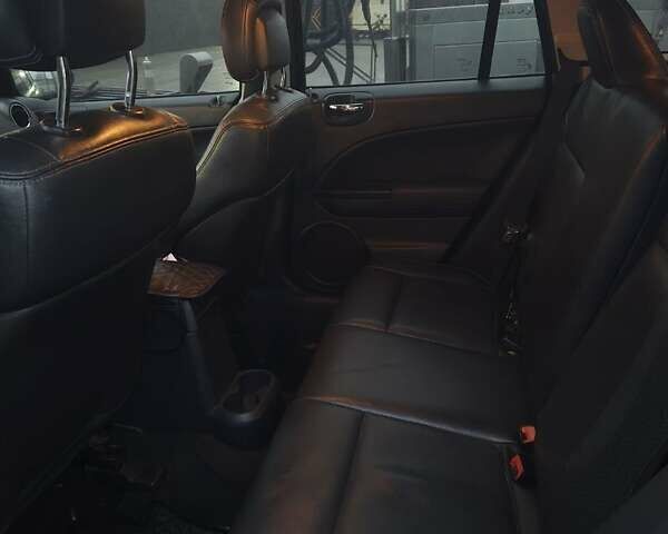 Черный Додж Калибер, объемом двигателя 2.36 л и пробегом 177 тыс. км за 7899 $, фото 4 на Automoto.ua