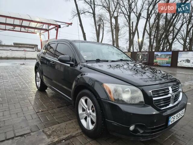 Черный Додж Калибер, объемом двигателя 2.36 л и пробегом 177 тыс. км за 7899 $, фото 31 на Automoto.ua