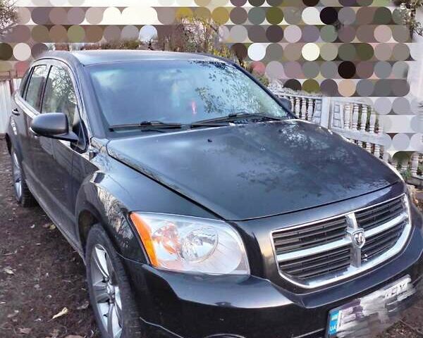 Черный Додж Калибер, объемом двигателя 2 л и пробегом 215 тыс. км за 6000 $, фото 9 на Automoto.ua