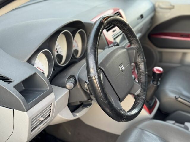 Черный Додж Калибер, объемом двигателя 2 л и пробегом 250 тыс. км за 3400 $, фото 5 на Automoto.ua