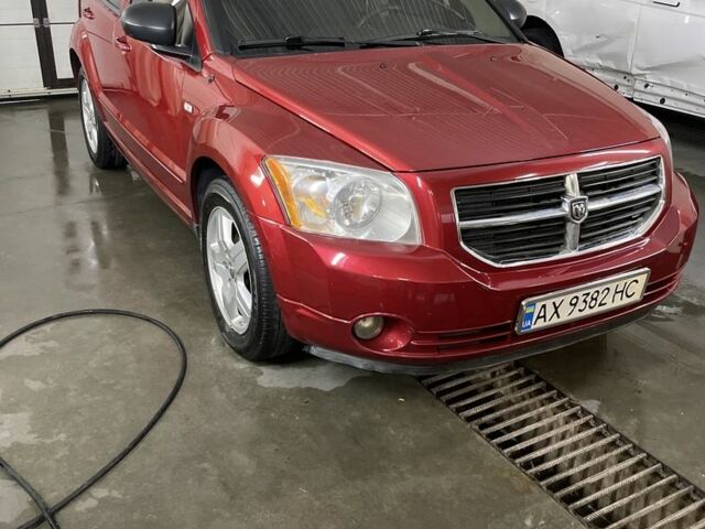 Красный Додж Калибер, объемом двигателя 2 л и пробегом 250 тыс. км за 4999 $, фото 1 на Automoto.ua