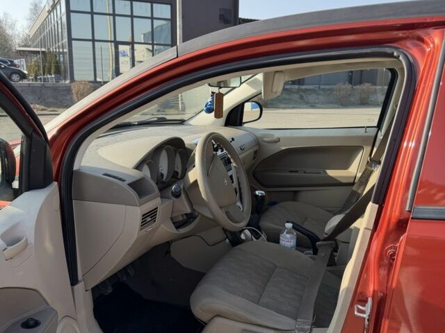 Красный Додж Калибер, объемом двигателя 2 л и пробегом 248 тыс. км за 4800 $, фото 9 на Automoto.ua