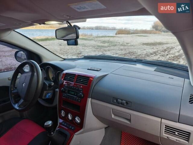 Красный Додж Калибер, объемом двигателя 2 л и пробегом 334 тыс. км за 6500 $, фото 1 на Automoto.ua