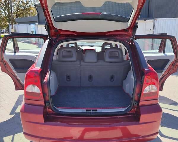 Красный Додж Калибер, объемом двигателя 1.8 л и пробегом 155 тыс. км за 6300 $, фото 9 на Automoto.ua