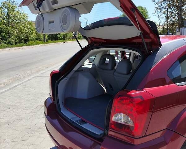Красный Додж Калибер, объемом двигателя 1.8 л и пробегом 155 тыс. км за 6300 $, фото 16 на Automoto.ua