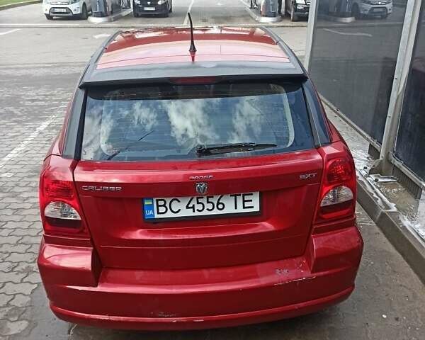 Красный Додж Калибер, объемом двигателя 2 л и пробегом 240 тыс. км за 5700 $, фото 1 на Automoto.ua