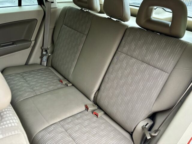 Красный Додж Калибер, объемом двигателя 2 л и пробегом 257 тыс. км за 5750 $, фото 12 на Automoto.ua