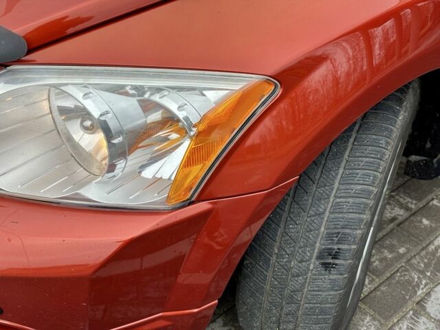 Красный Додж Калибер, объемом двигателя 2 л и пробегом 257 тыс. км за 5750 $, фото 6 на Automoto.ua