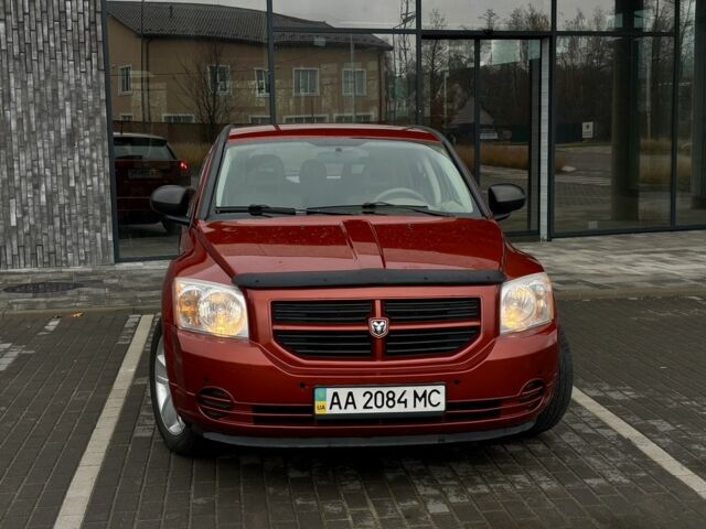 Красный Додж Калибер, объемом двигателя 2 л и пробегом 257 тыс. км за 5750 $, фото 1 на Automoto.ua