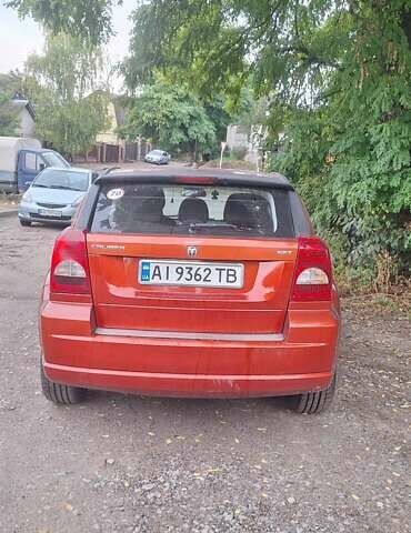 Красный Додж Калибер, объемом двигателя 2 л и пробегом 204 тыс. км за 5500 $, фото 1 на Automoto.ua