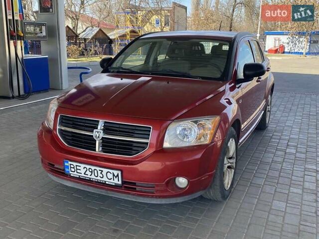 Красный Додж Калибер, объемом двигателя 2 л и пробегом 206 тыс. км за 6900 $, фото 1 на Automoto.ua