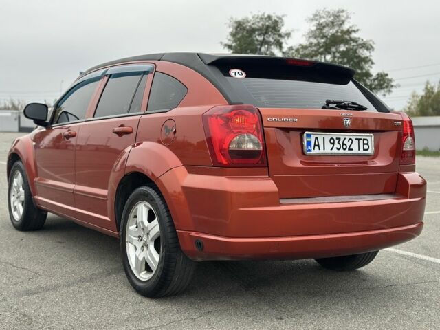 Красный Додж Калибер, объемом двигателя 2 л и пробегом 201 тыс. км за 5750 $, фото 4 на Automoto.ua