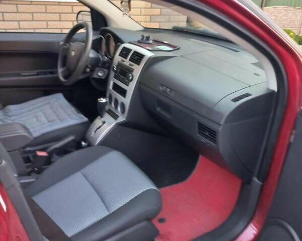 Красный Додж Калибер, объемом двигателя 2 л и пробегом 140 тыс. км за 6500 $, фото 1 на Automoto.ua