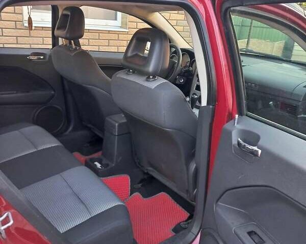 Красный Додж Калибер, объемом двигателя 2 л и пробегом 140 тыс. км за 6500 $, фото 3 на Automoto.ua