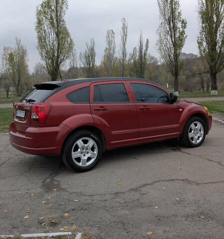 Красный Додж Калибер, объемом двигателя 2 л и пробегом 205 тыс. км за 7800 $, фото 4 на Automoto.ua