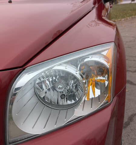 Красный Додж Калибер, объемом двигателя 2 л и пробегом 205 тыс. км за 7800 $, фото 9 на Automoto.ua