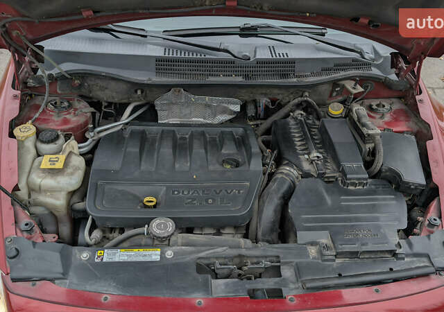 Красный Додж Калибер, объемом двигателя 2 л и пробегом 205 тыс. км за 7800 $, фото 19 на Automoto.ua