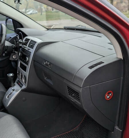 Красный Додж Калибер, объемом двигателя 2 л и пробегом 205 тыс. км за 7800 $, фото 32 на Automoto.ua