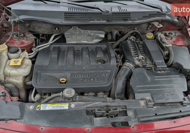 Красный Додж Калибер, объемом двигателя 2 л и пробегом 205 тыс. км за 7800 $, фото 20 на Automoto.ua