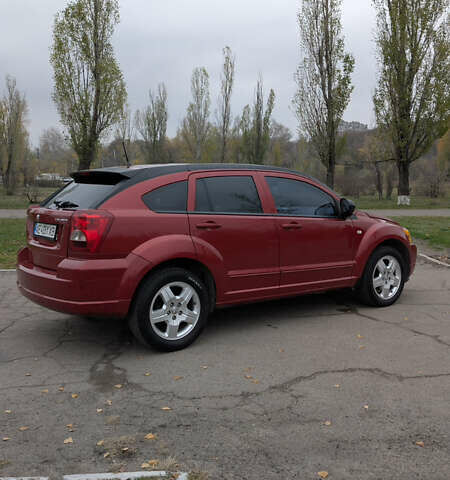 Красный Додж Калибер, объемом двигателя 2 л и пробегом 205 тыс. км за 7800 $, фото 5 на Automoto.ua