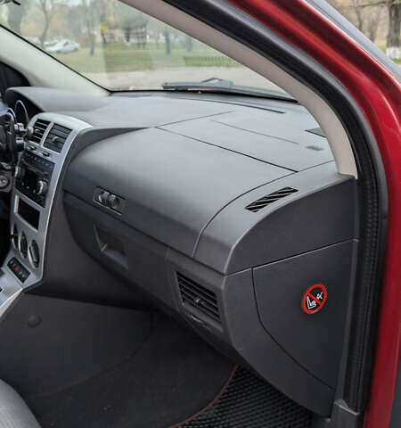 Красный Додж Калибер, объемом двигателя 2 л и пробегом 205 тыс. км за 7800 $, фото 33 на Automoto.ua