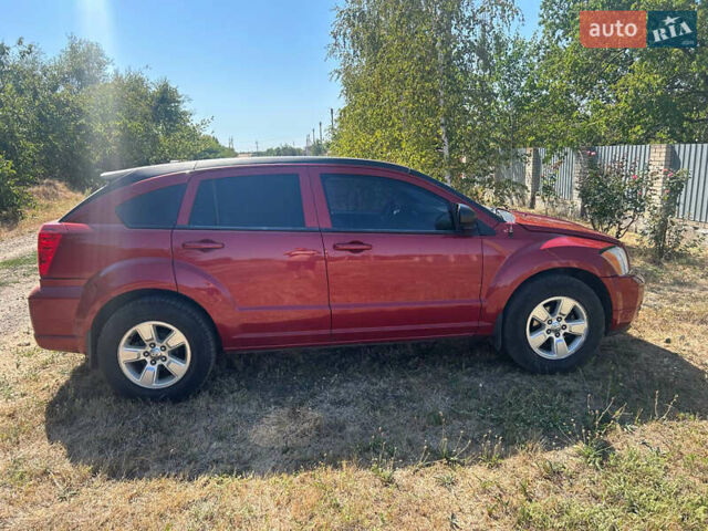 Красный Додж Калибер, объемом двигателя 2 л и пробегом 219 тыс. км за 7300 $, фото 5 на Automoto.ua