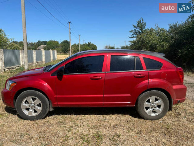 Красный Додж Калибер, объемом двигателя 2 л и пробегом 219 тыс. км за 7300 $, фото 4 на Automoto.ua