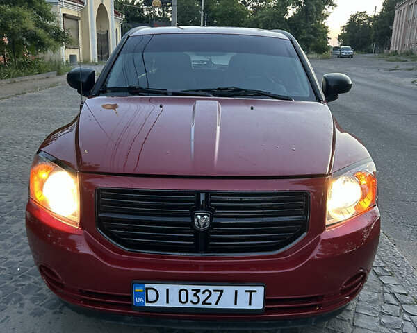 Красный Додж Калибер, объемом двигателя 2 л и пробегом 219 тыс. км за 7300 $, фото 2 на Automoto.ua