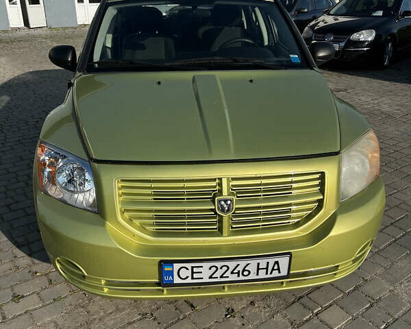Желтый Додж Калибер, объемом двигателя 2 л и пробегом 175 тыс. км за 7400 $, фото 2 на Automoto.ua