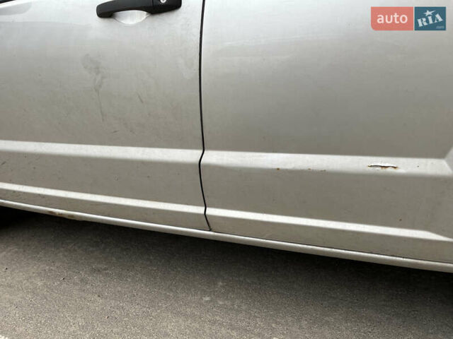 Серый Додж Калибер, объемом двигателя 1.8 л и пробегом 331 тыс. км за 4200 $, фото 5 на Automoto.ua