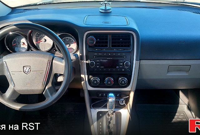 Сірий Додж Caliber, об'ємом двигуна 2 л та пробігом 289 тис. км за 6900 $, фото 7 на Automoto.ua